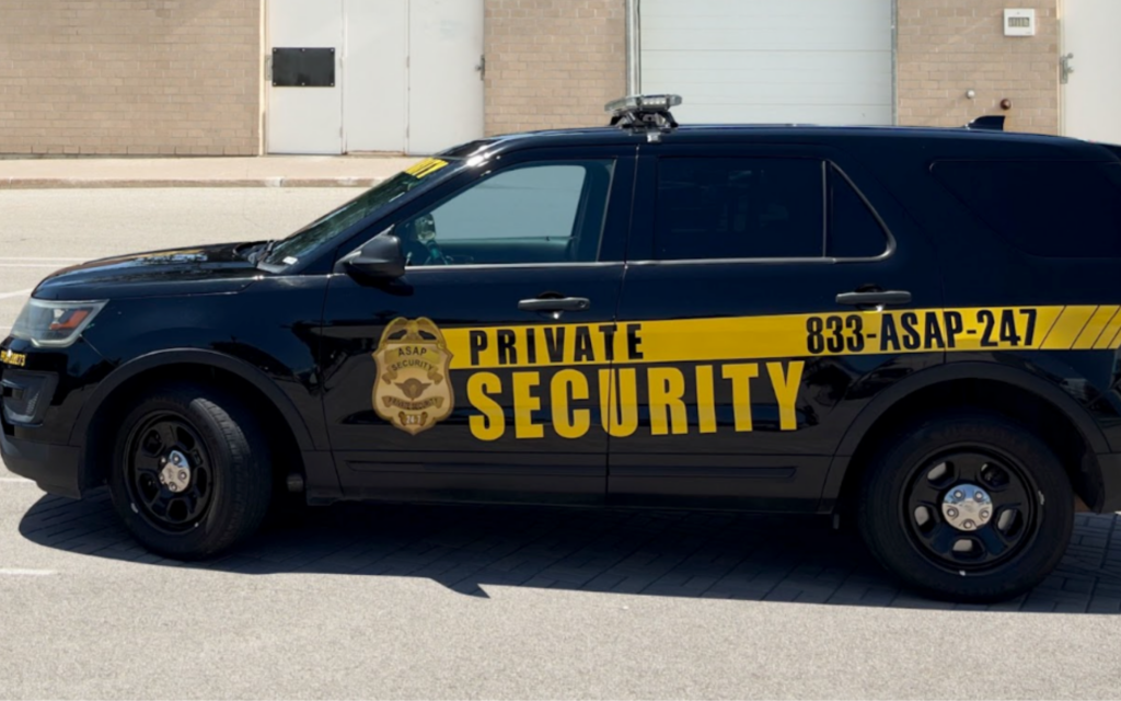 ASAP private security patrol vehicle outside of a warehouse