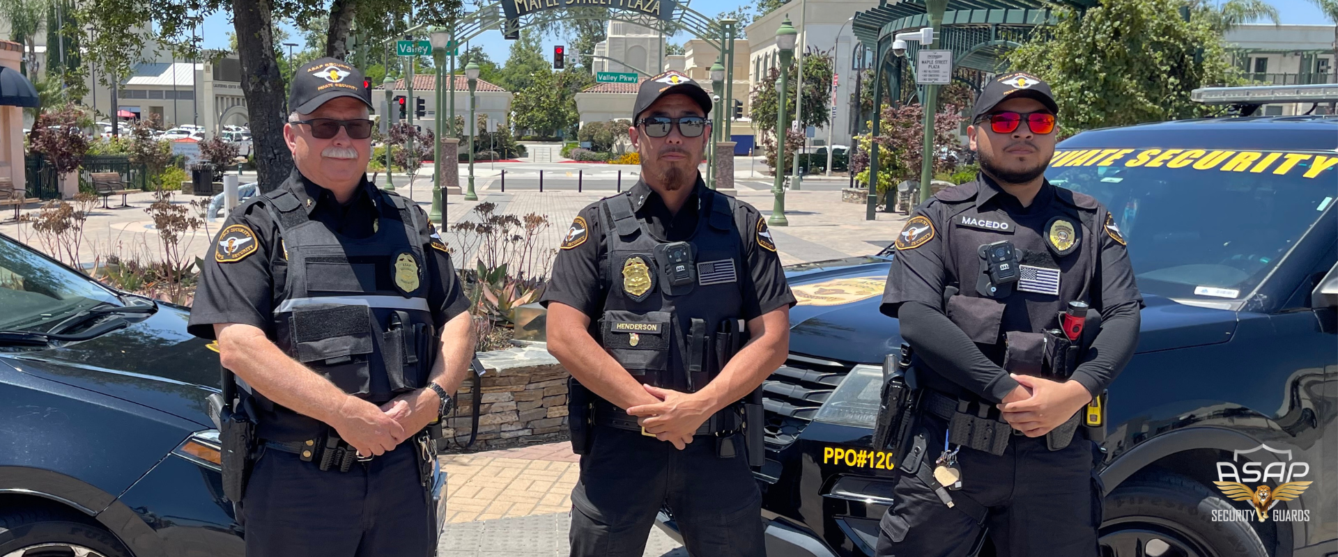 Three security guards with patrol cars