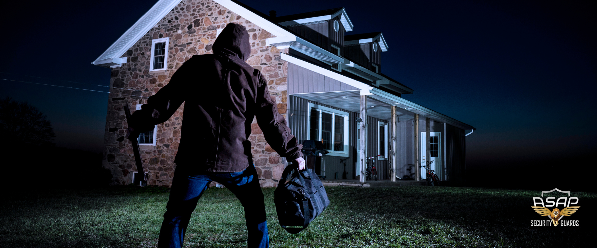 residential security burglar outside of home