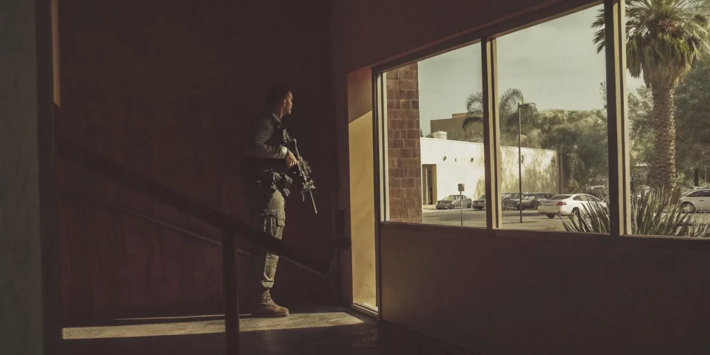 Armed security officer protecting a high-risk commercial facility
