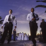 Professional event security guards coordinating at a San Diego event