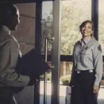 School security guard meeting with an administrator