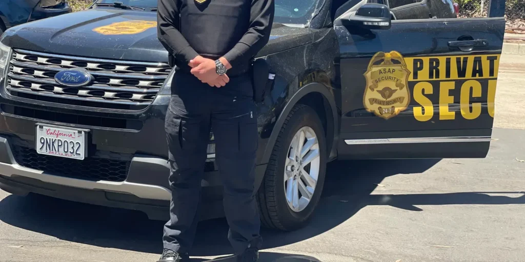 Security guard walking an outdoor self storage facility lane